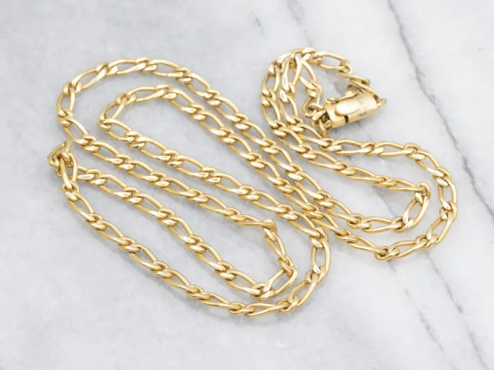 Long Yellow Goud Figaro Chain