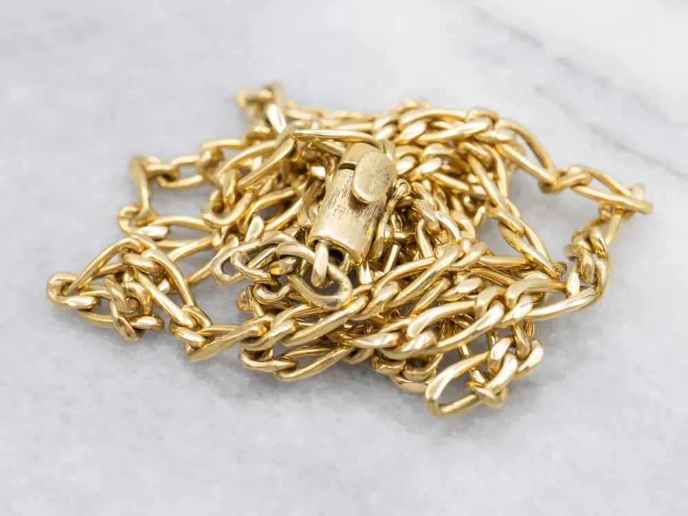 Long Yellow Goud Figaro Chain