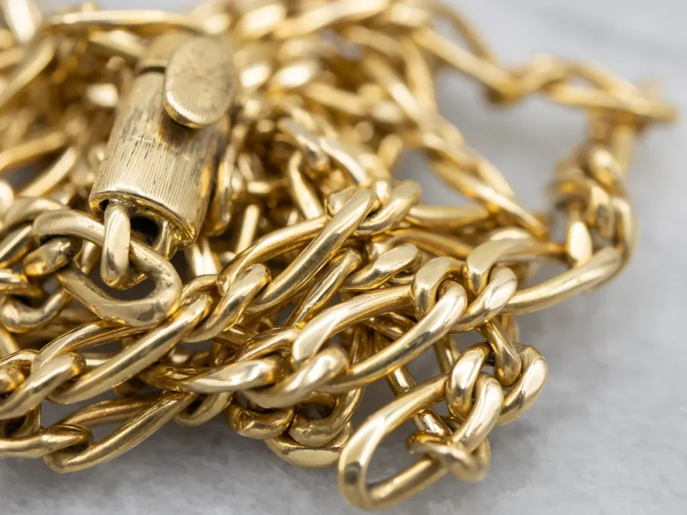 Long Yellow Goud Figaro Chain